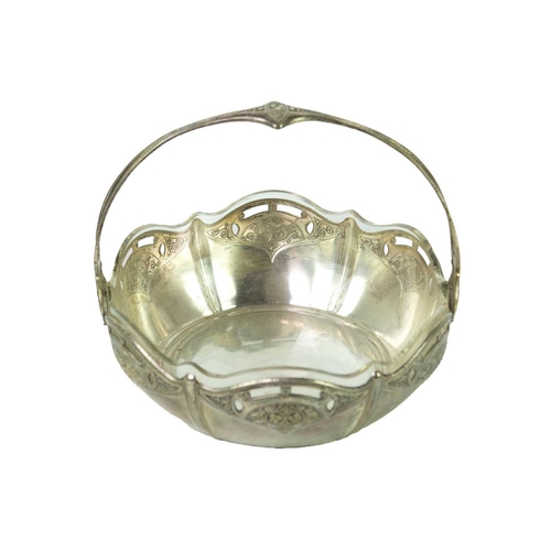 56 - A WMF silver plated basket. With fixed overhead handle and a shaped glass liner, stamped marks, heig... 