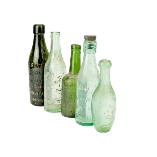 63 - A glass mineral water bottle E. Wakeham Mineral Water Works Gulval Penzance. Height 18cm, together w... 