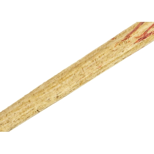 64 - A 19th century sailor's whalebone and marine ivory walking cane. Length 90.5cm.