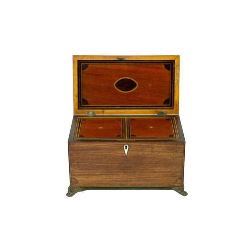 68 - A George III mahogany, inlaid, and crossbanded tea caddy. Fitted two lidded compartments, on stamped... 