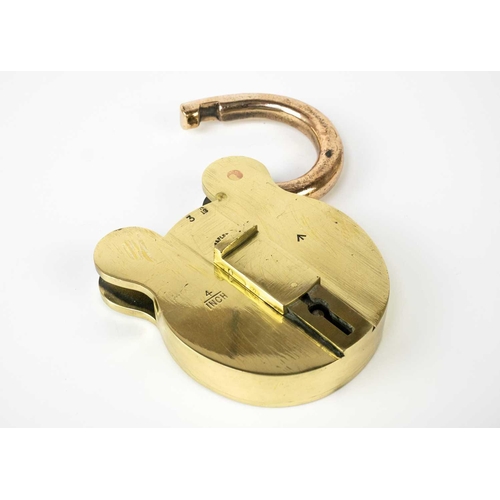 71 - A large brass padlock circa 1930. By Lowe & Fletcher broad arrow mark, height 16cm.