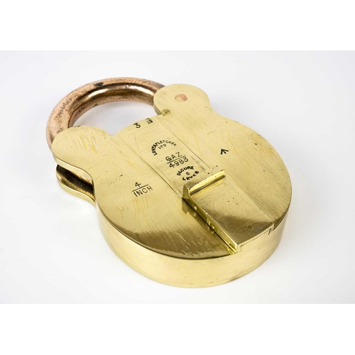 71 - A large brass padlock circa 1930. By Lowe & Fletcher broad arrow mark, height 16cm.