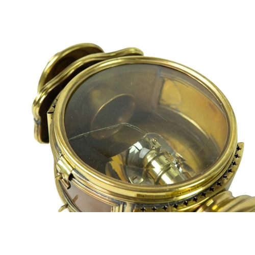 78 - A brass nautical candle lamp With White Star Line plaque, length 53.5cm.