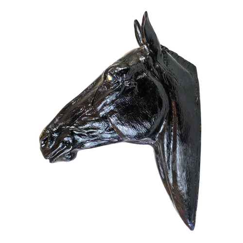 79 - A life sized fibre glass model of a horses head. Height 75cm, width 24cm, depth 55cm.