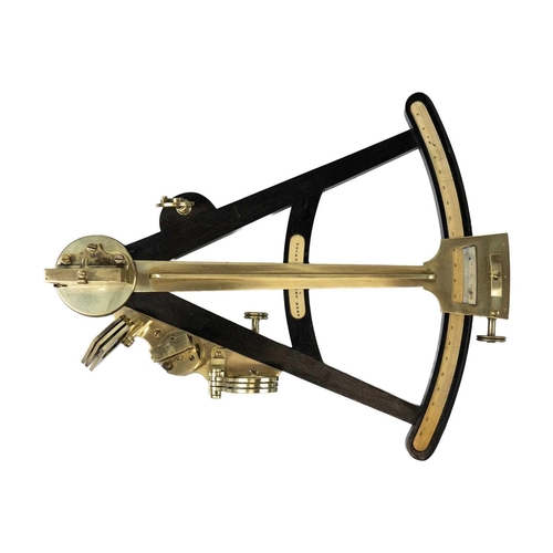 85 - A 19th century ebony and brass octant. The central panel reads Owen Owens Liverpool, length 31cm.