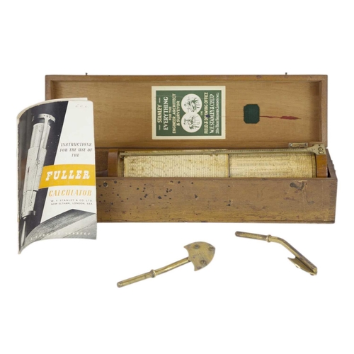 86 - A Fullers Calculator by Stanley. Complete with instruction manual, box length 46cm.