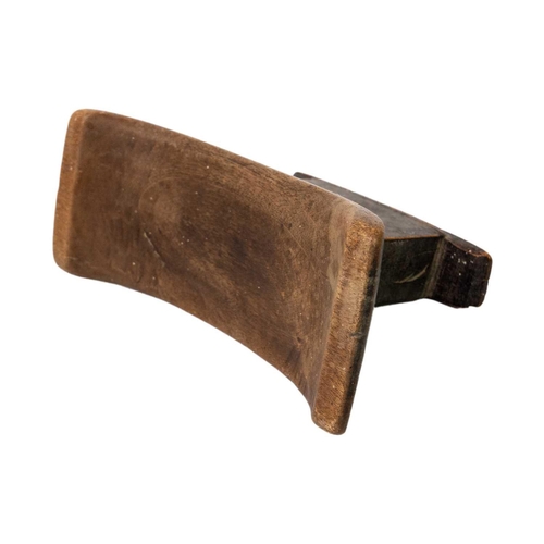 90 - A Zimbabwean Tonga headrest Early 20th century, with a curved top, and rectangular support, height 1... 