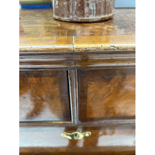 1000 - A George II burr elm and yew banded chest on stand. The upper with two short and three long drawers ... 