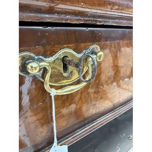 1000 - A George II burr elm and yew banded chest on stand. The upper with two short and three long drawers ... 