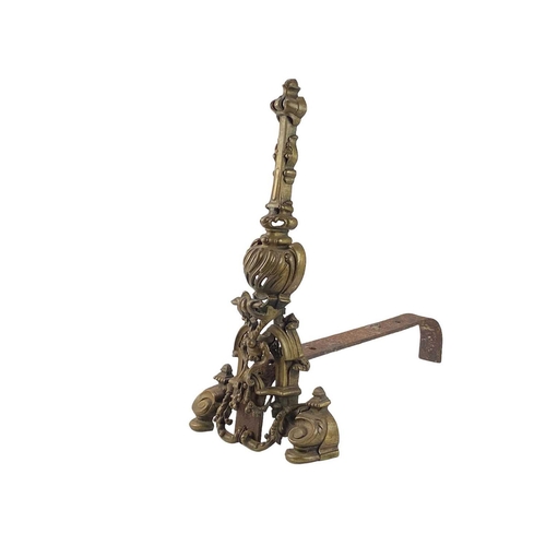 1 - A pair of French brass chenets. In Louis XVI style, height 50cm.