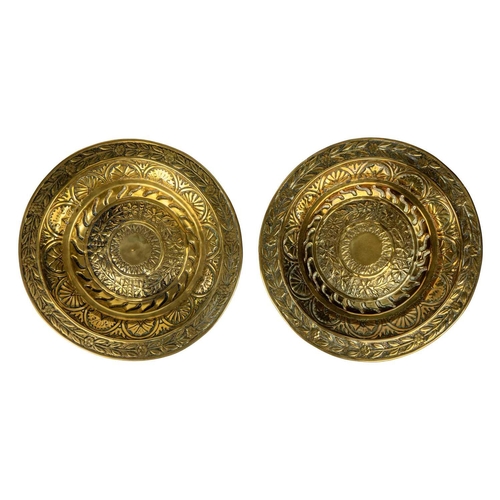 127 - A pair of brass alms dishes, 19th century. Height 4cm, diameter 28cm. (2)