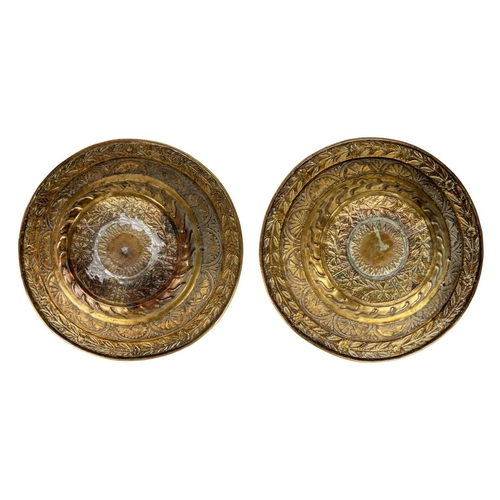 127 - A pair of brass alms dishes, 19th century. Height 4cm, diameter 28cm. (2)