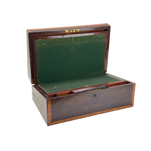 131 - A 19th century mahogany and satinwood banded writing box. Fitted a side drawer, height 17.5cm, width... 