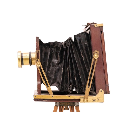 152 - UnNamed plate camera with tripod and eight mahogany plates Together with a brass Watkins Exposure Me... 