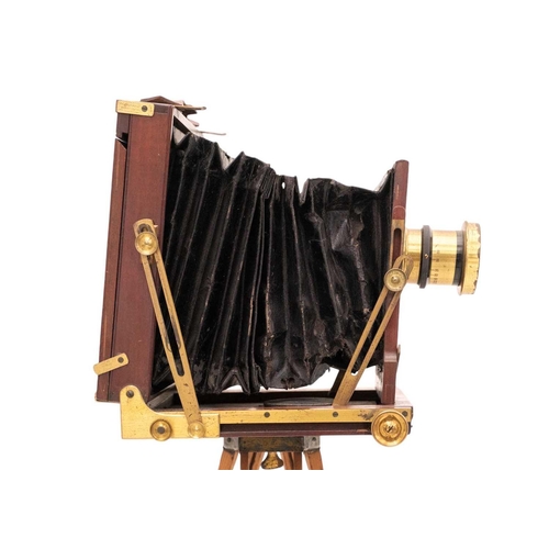 152 - UnNamed plate camera with tripod and eight mahogany plates Together with a brass Watkins Exposure Me... 