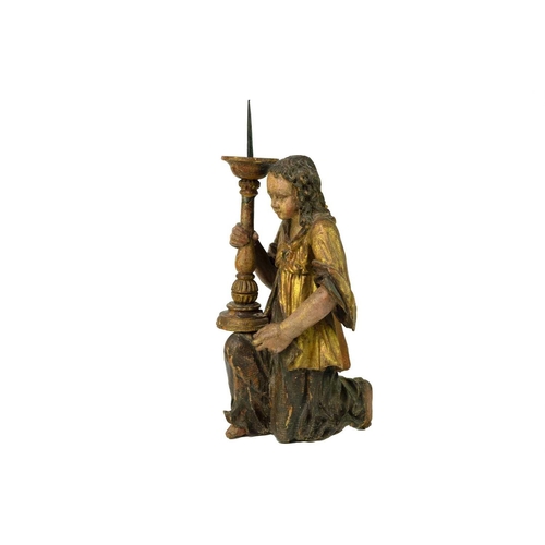 170 - A painted and gilt altar pricket candlestick. 17th/18th century, probably Italian, carved as a kneel... 