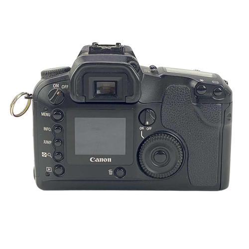 179 - A Canon EOS 40D camera body. Fitted with a Compact-Macro 50mm lens, together with a Canon D60 camera... 