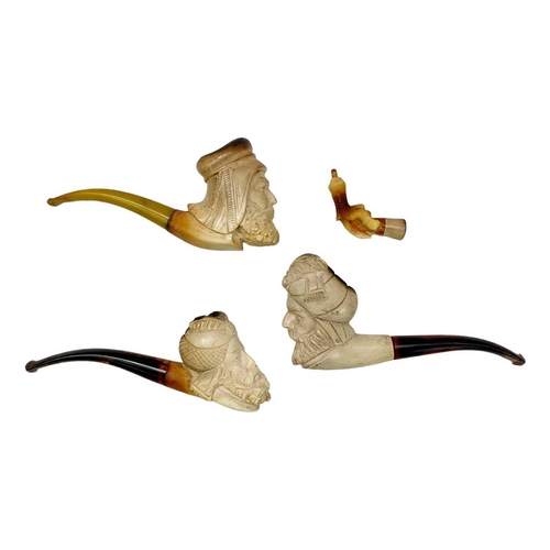 181 - A Turkish meerschaum pipe in a fitted case. Together with three other meerschaum pipes. (4)