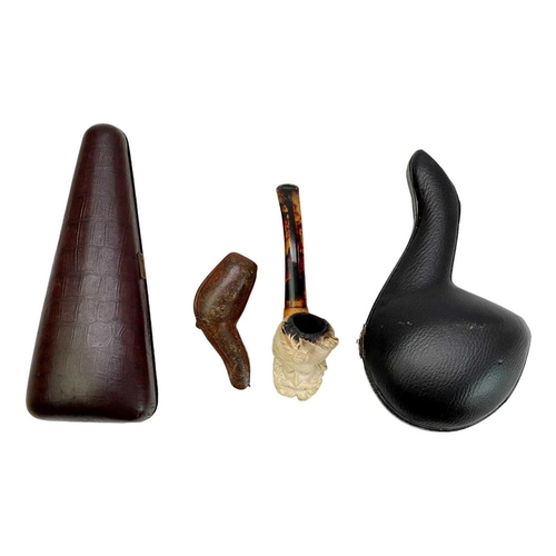 181 - A Turkish meerschaum pipe in a fitted case. Together with three other meerschaum pipes. (4)