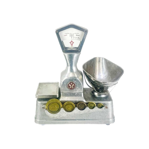 189 - A set of Vandome and Hart Ltd of London aluminium shop scales. With five weights. Height 46cm.