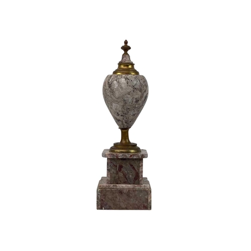 196 - Marble and gilt metal urn. Probably from a clock garniture.