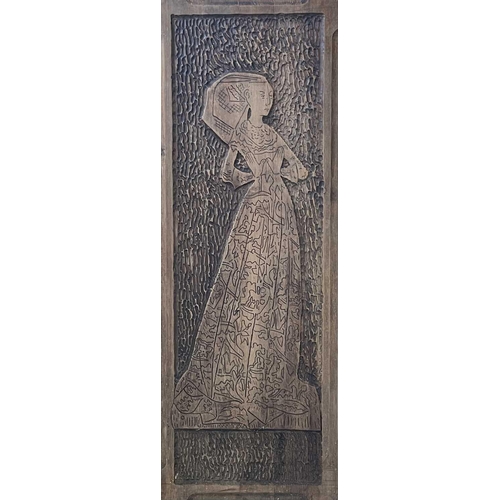 202 - A carved stained pine panel of a medieval brass rubbing. 20th century, with an image of Lady Margare... 