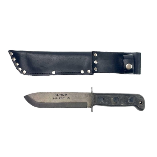 222 - A British military issue type-D survival knife. With blackened steel blade and ebonised grip, stampe... 