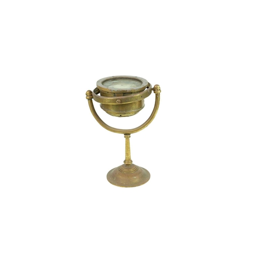 239 - A Cassens & Plath brass binnacle compass. On a gimbal stand, number 6275/4, height 27cm, diameter of... 