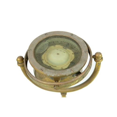 239 - A Cassens & Plath brass binnacle compass. On a gimbal stand, number 6275/4, height 27cm, diameter of... 