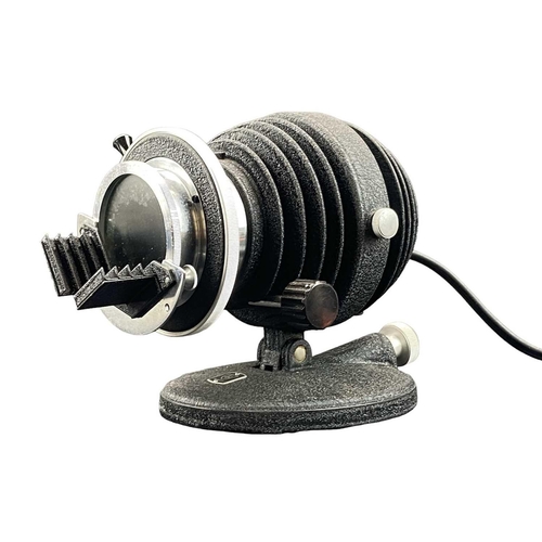 25 - An American Optical Company microscope lamp. Height 18cm.