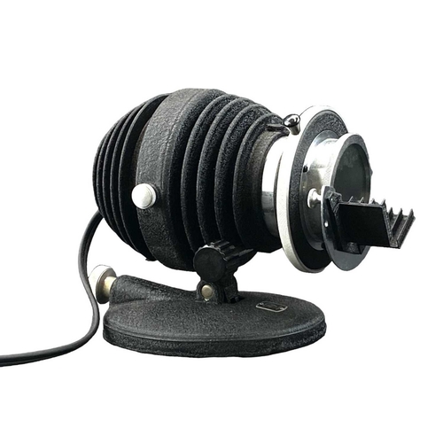 25 - An American Optical Company microscope lamp. Height 18cm.