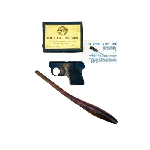 32 - A South Seas throwing club. With elongated head, length 42cm together with a Sports Starting Pistol ... 