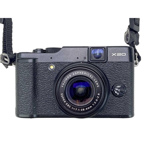 55 - A Fujifilm X20 digital camera. With battery charger and manual.