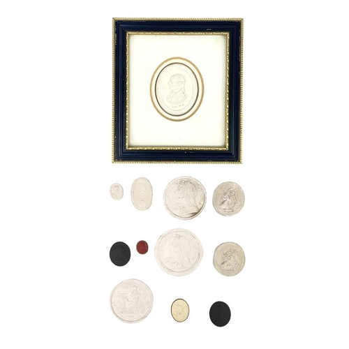 60 - A collection of twelve intaglios. In plaster and pottery, including one framed 19th century and late... 