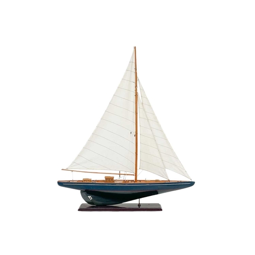 61 - A model of a yacht. Modern, with a blue painted hull, on a painted base, height 110cm.