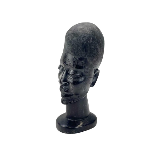 65 - A wood carved lobed bowl. Inscribed 1811-1841 diameter 41cm together with an African hardwood bust, ... 