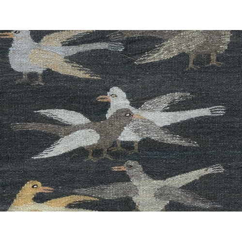 119 - A Bessarabian flatweave runner, early 20th century. The charcoal field with multiple rows of birds, ... 