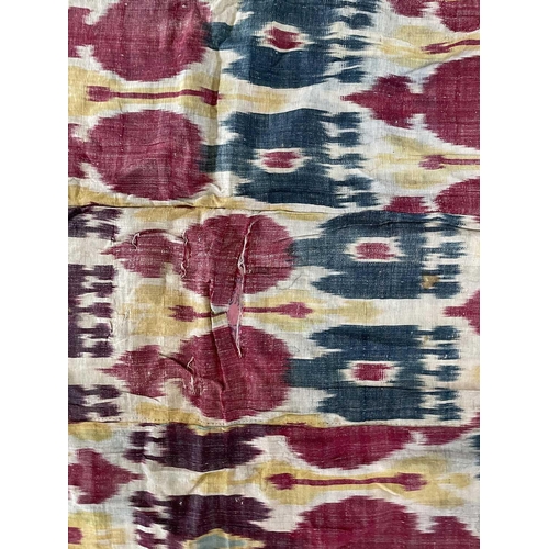 125 - A silk and cotton Ikat parda, Uzbekistan, 19th century. 177 x 131cm.