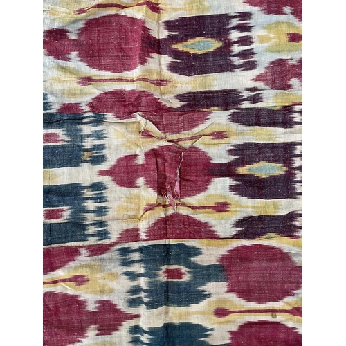 125 - A silk and cotton Ikat parda, Uzbekistan, 19th century. 177 x 131cm.