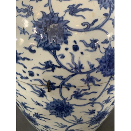 126 - A Chinese blue and white porcelain ovoid jar, Ming Dynasty. With all over scrolling lotus decoration... 