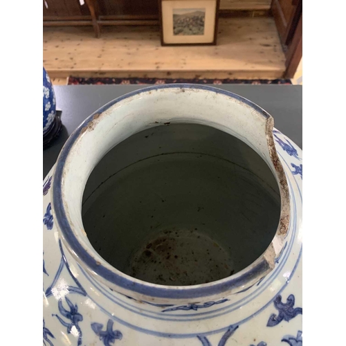 126 - A Chinese blue and white porcelain ovoid jar, Ming Dynasty. With all over scrolling lotus decoration... 