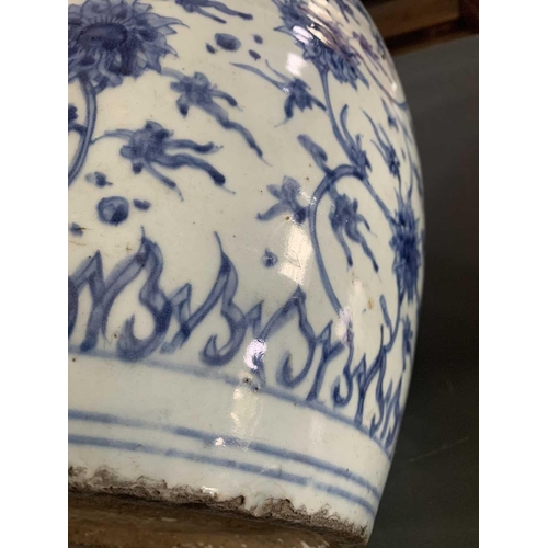 126 - A Chinese blue and white porcelain ovoid jar, Ming Dynasty. With all over scrolling lotus decoration... 