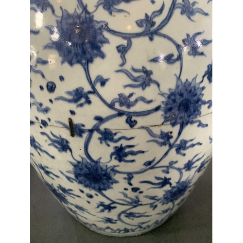 126 - A Chinese blue and white porcelain ovoid jar, Ming Dynasty. With all over scrolling lotus decoration... 