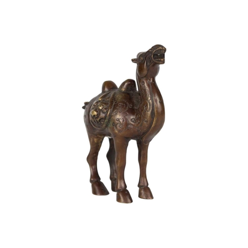 127 - A South East Asian bronze model of a camel. Height 16cm, width 12.5cm.