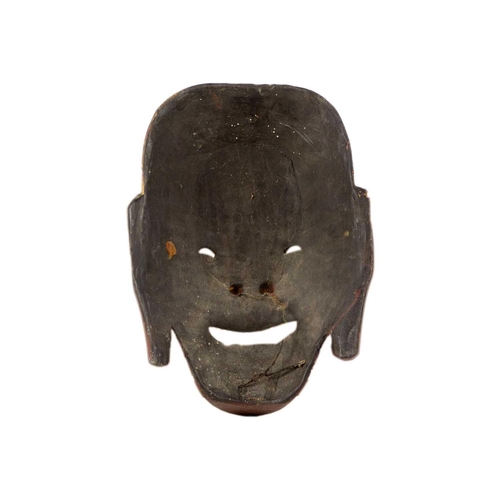 128 - A Japanese carved wood theatre mask. 24.5 x 18cm.