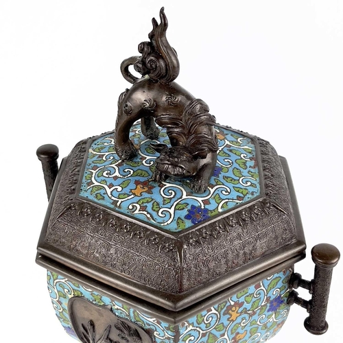 129 - A Japanese bronze and cloisonne incense burner, Meiji period. The cover surmounted by a temple lion ... 