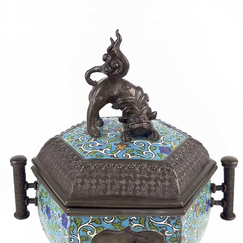 129 - A Japanese bronze and cloisonne incense burner, Meiji period. The cover surmounted by a temple lion ... 