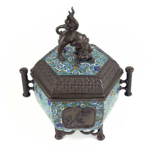 129 - A Japanese bronze and cloisonne incense burner, Meiji period. The cover surmounted by a temple lion ... 