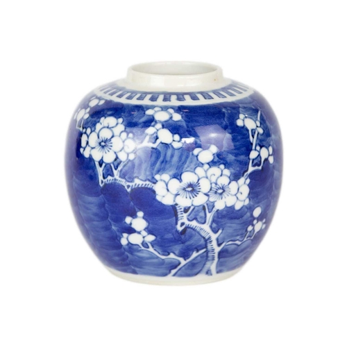 143 - A Chinese blue and white prunus pattern ginger jar. Height 12.5cm, width 12.5cm and two Chinese porc... 