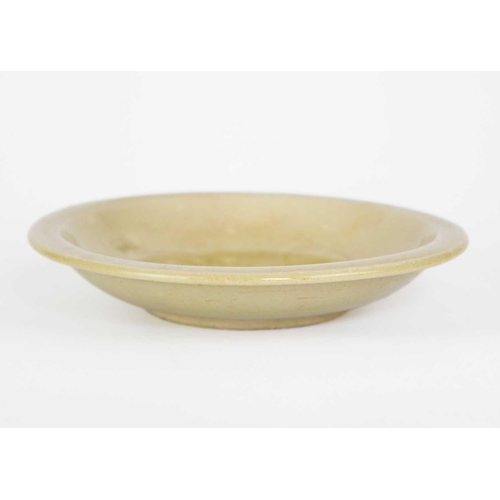 150 - A Chinese celadon glazed bowl. Height 4cm, diameter 21.5cm.